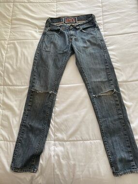Levi's Skinny 511 Jeans in Faded Blue with Knee Rips
